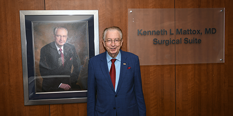 Dr. Mattox standing outside the Kenneth L Mattox, M.D.,  Surgical Suite