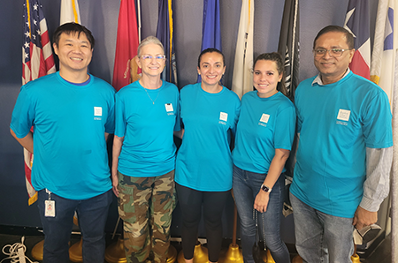 Five Baylor employees who volunteered with US Vets.