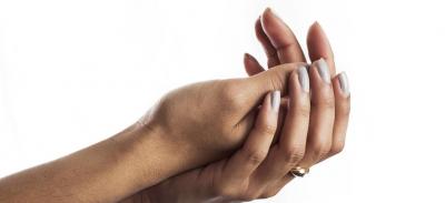 A woman's hands cupped together