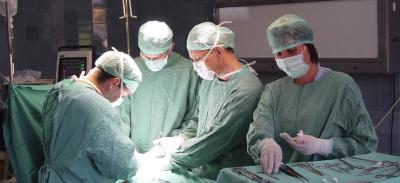 Doctors performing a surgery.