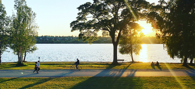 People practicing social distancing at a park.