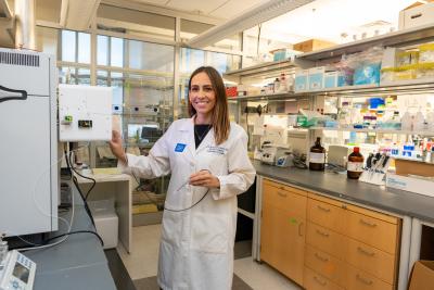 Dr. Eberlin demonstrating the MasSpec Pen in her lab