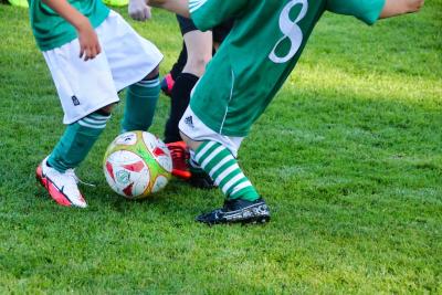 children playing soccer