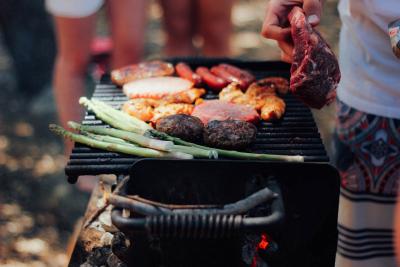 photo of a grill cover in meat and veggies