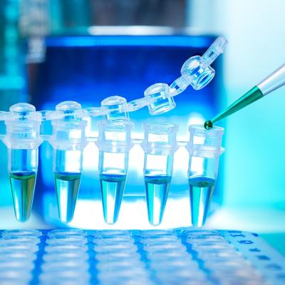 Photo of test tubes with blue liquid to represent basic science work
