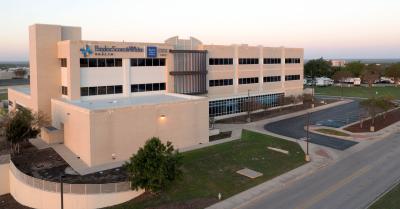 The Temple campus of Baylor College of Medicine. A large tan brick building.