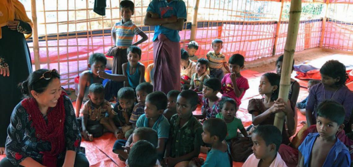 Dr. Banu with refugee children