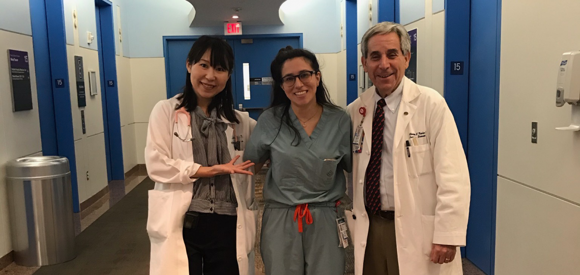 Maggie Taylor stands with doctors