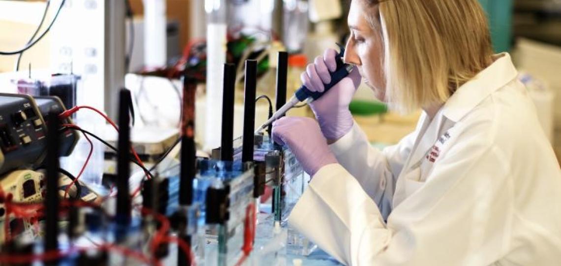 Pediatric resident conducting research in the lab