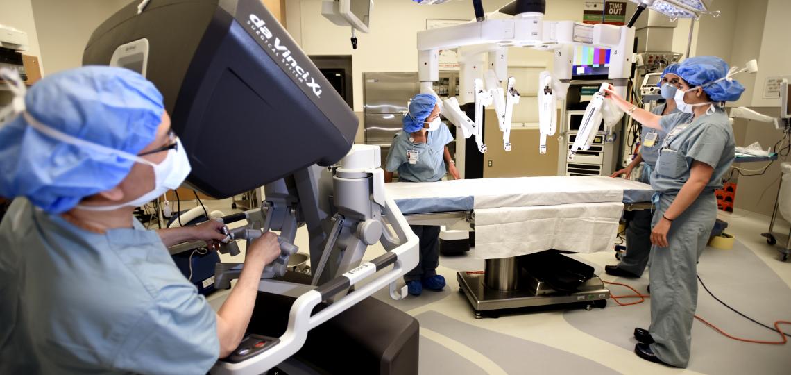 Dr. Ken Liao performing robotic surgery