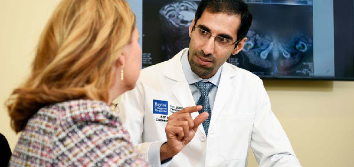 Surgical Oncologist with Patient 