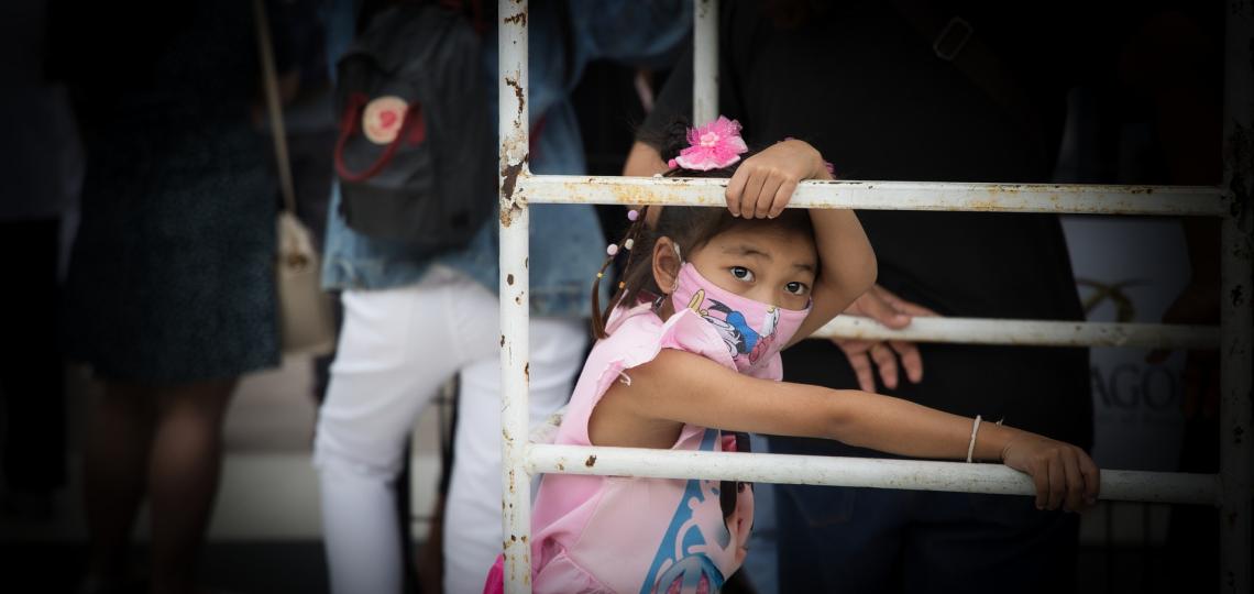 Image of little girl wearing a mask