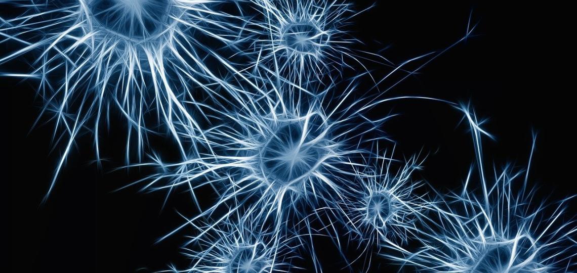 Blue burst of color to represent neurons or brain tumor growth