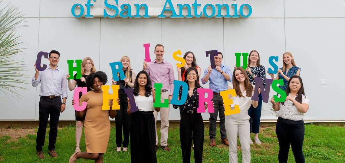 The class of 2026 holding letters that spell CHRISTUS Children's