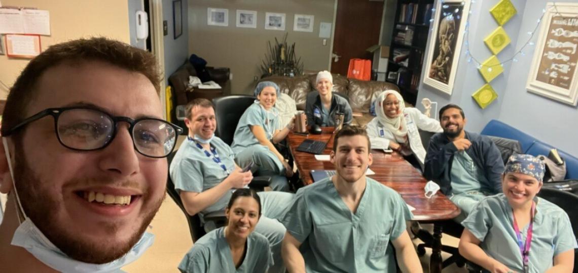 Orthopedic surgery resident members relaxing in scrubs