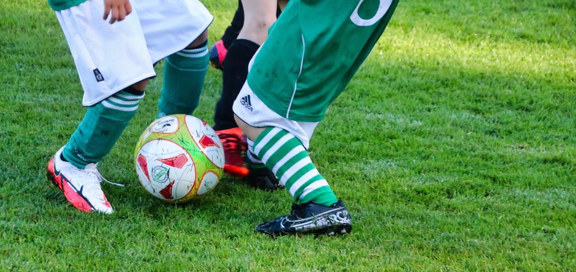 children playing soccer