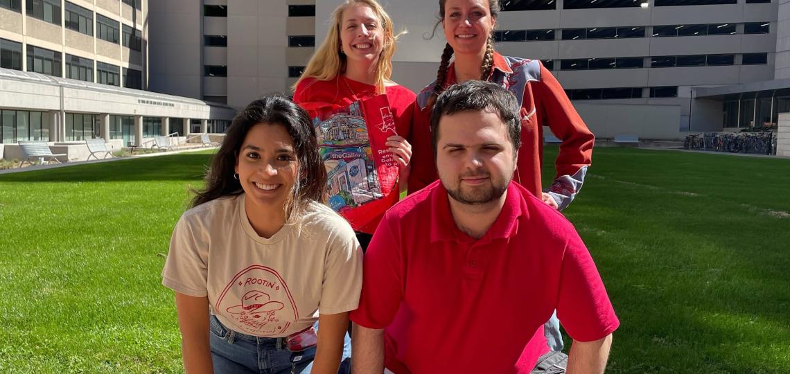 group of people smiling outside