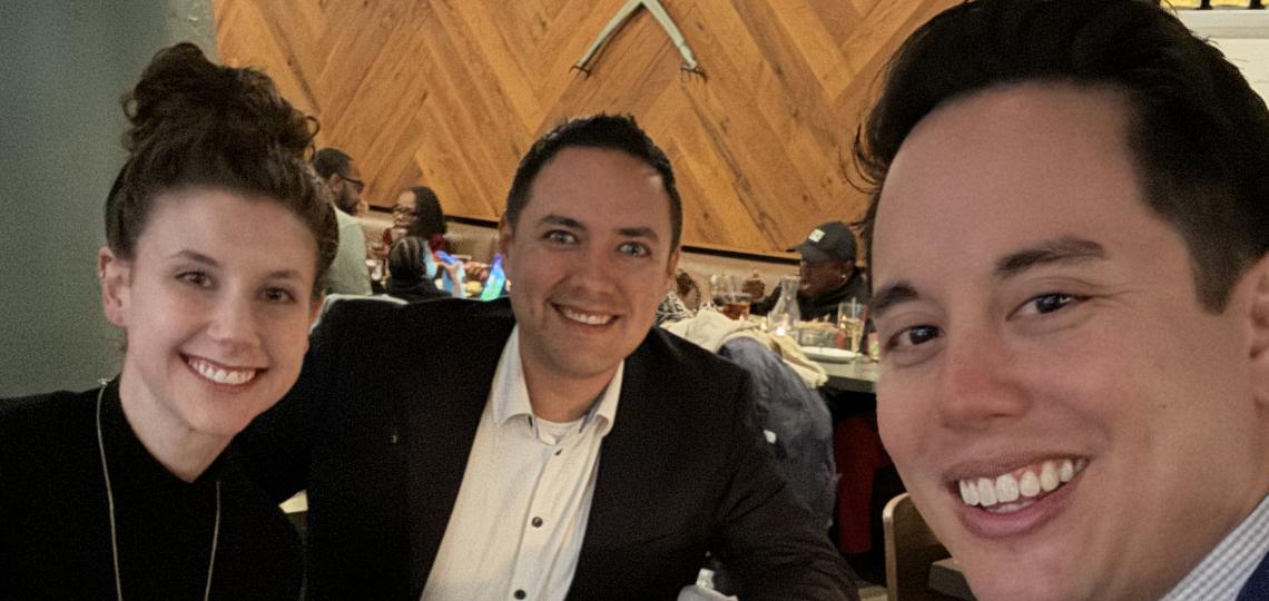 group smiling at dinner