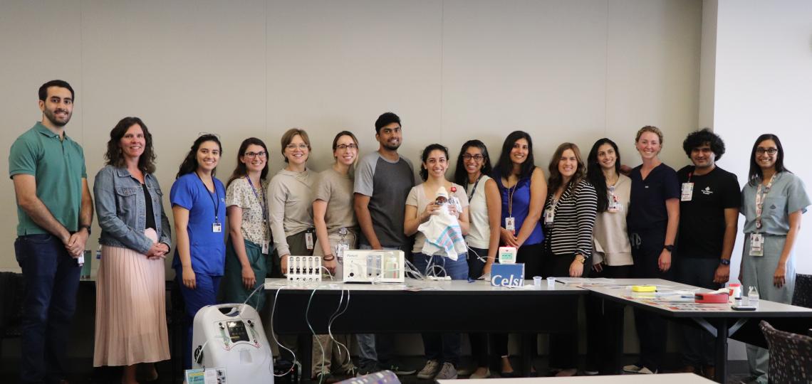 group of people smiling in a room
