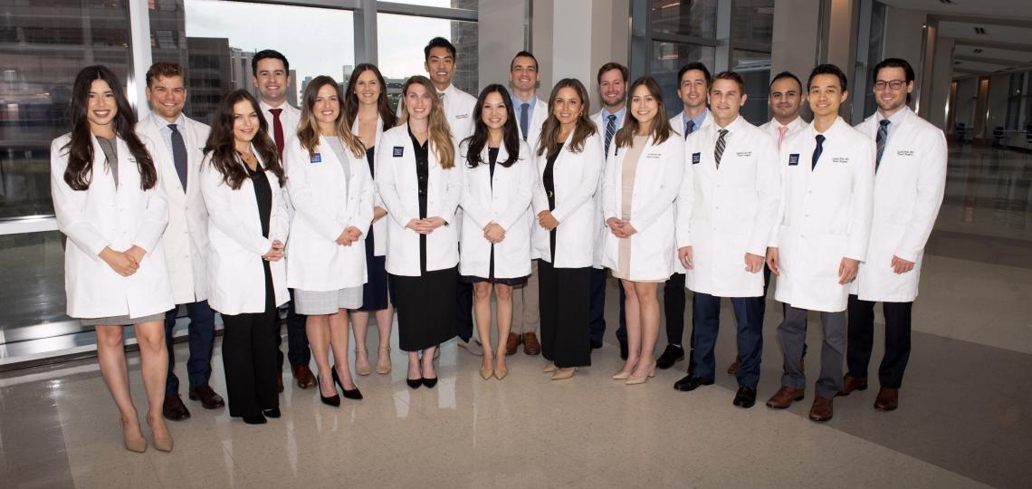 group of plastic surgery residents standing together and smiling