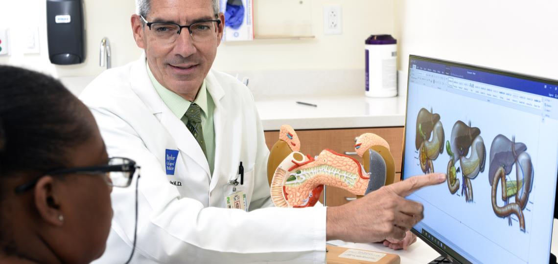 Dr. William Fisher with patient