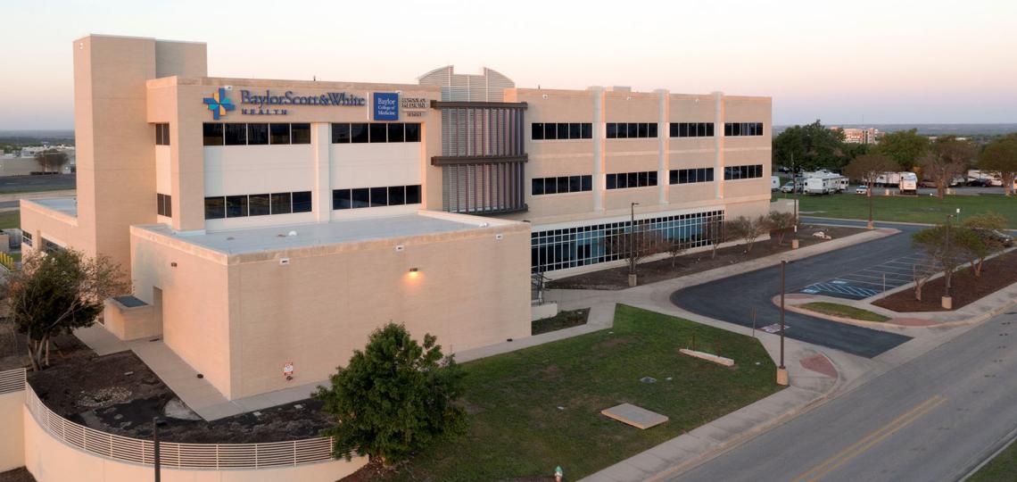 The Temple campus of Baylor College of Medicine. A large tan brick building.