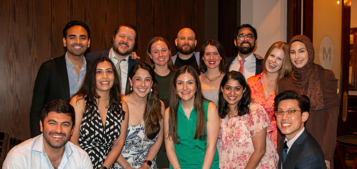 Group of individuals standing together for group photo