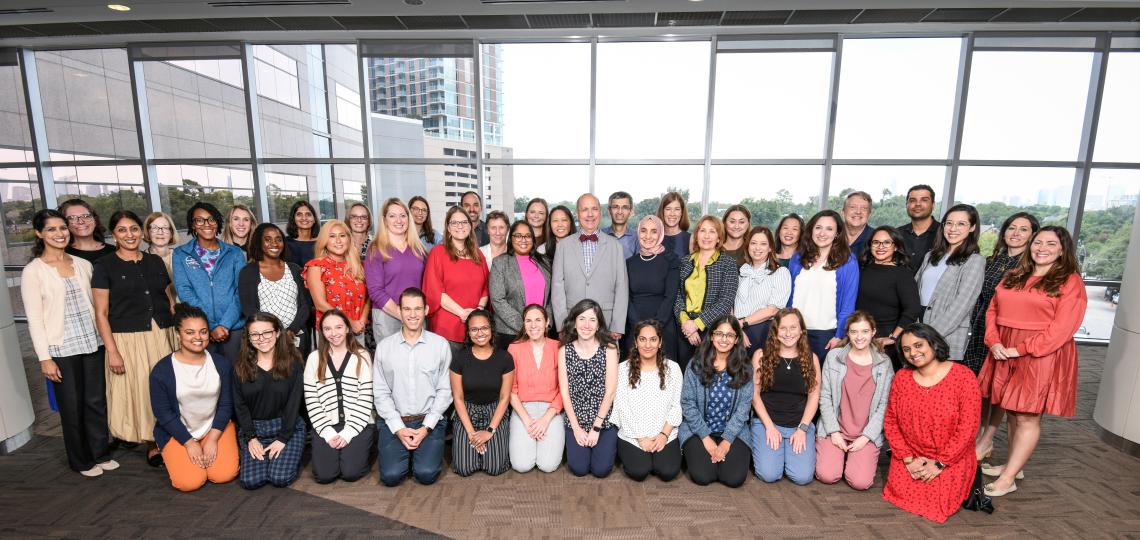 large group of people smiling