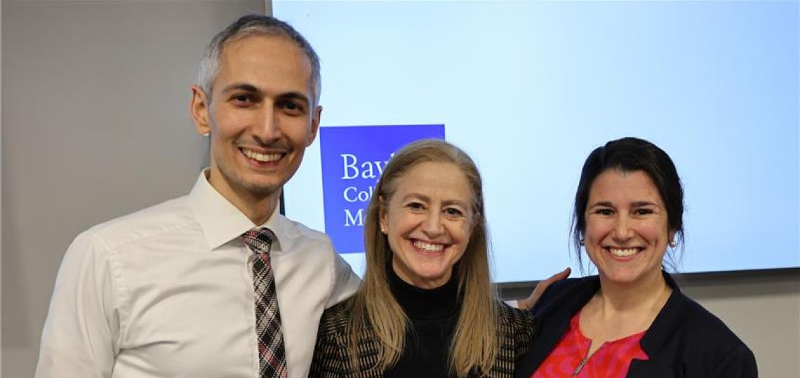 three individuals standing together