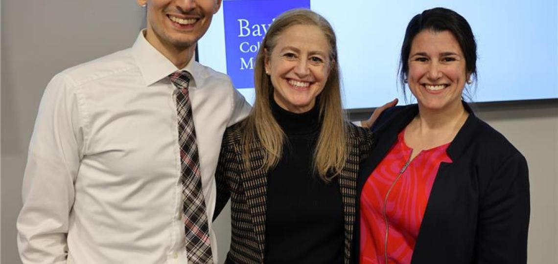 three individuals standing together