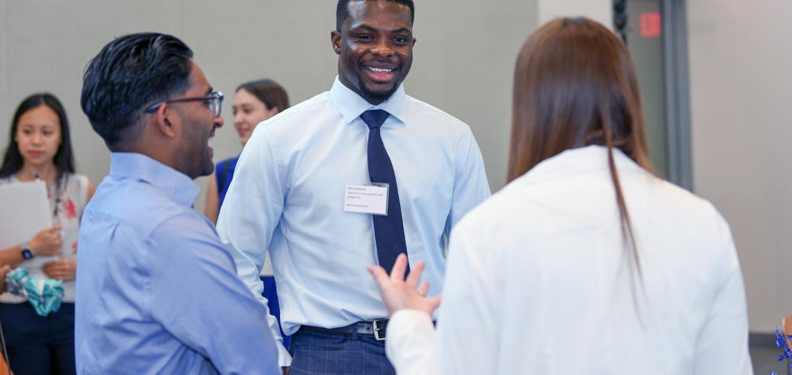 group of individuals laughing