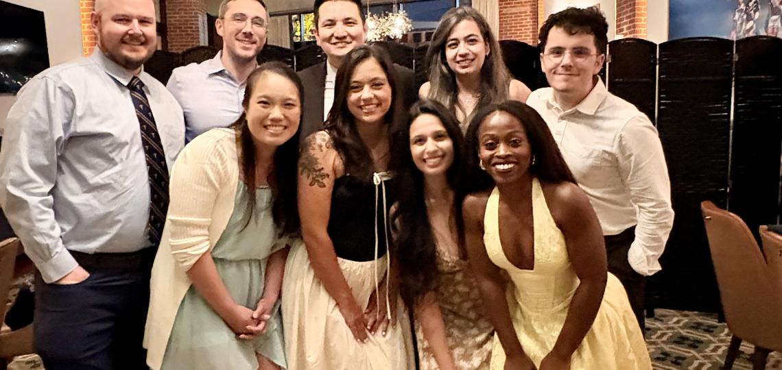 The class of 2026 in formal-wear smiling