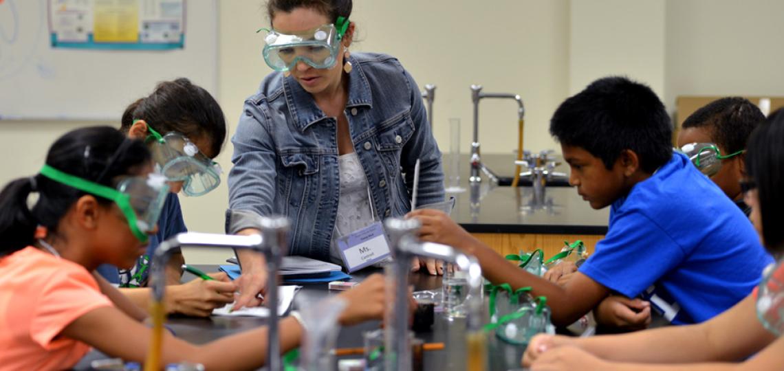 Middle school students working in the lab.
