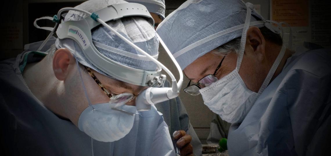 Drs. Bryan Burt and David Sugarbaker in the OR.
