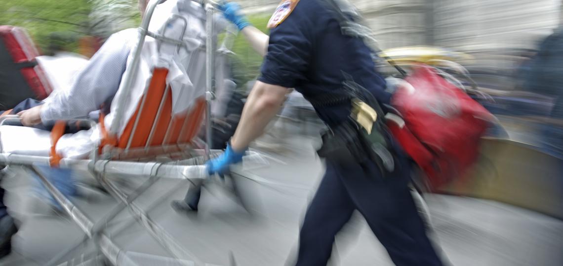 Emergency medical experts bring a trauma patient to a hospital.