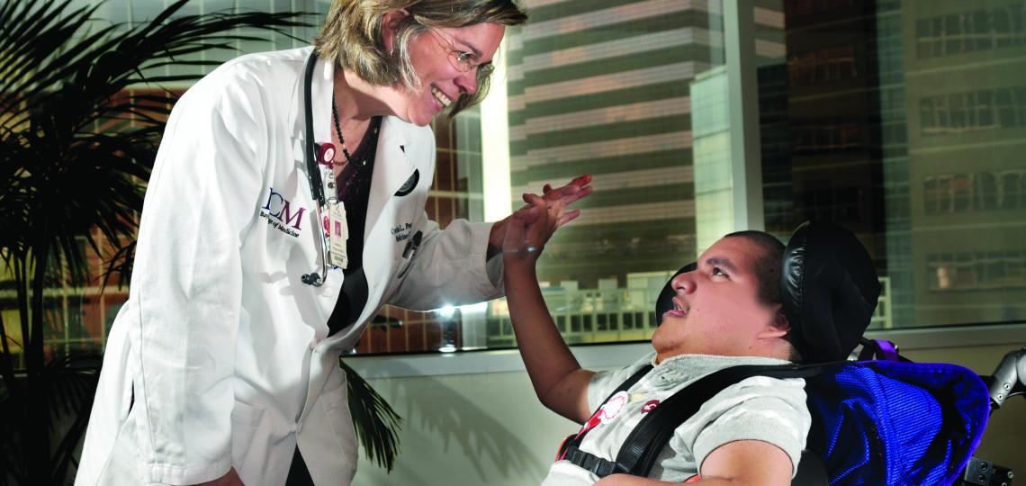 Jose Monzoro sees Dr. Peacock at the Transition Medicine Clinic for support in managing his cerebral palsy.