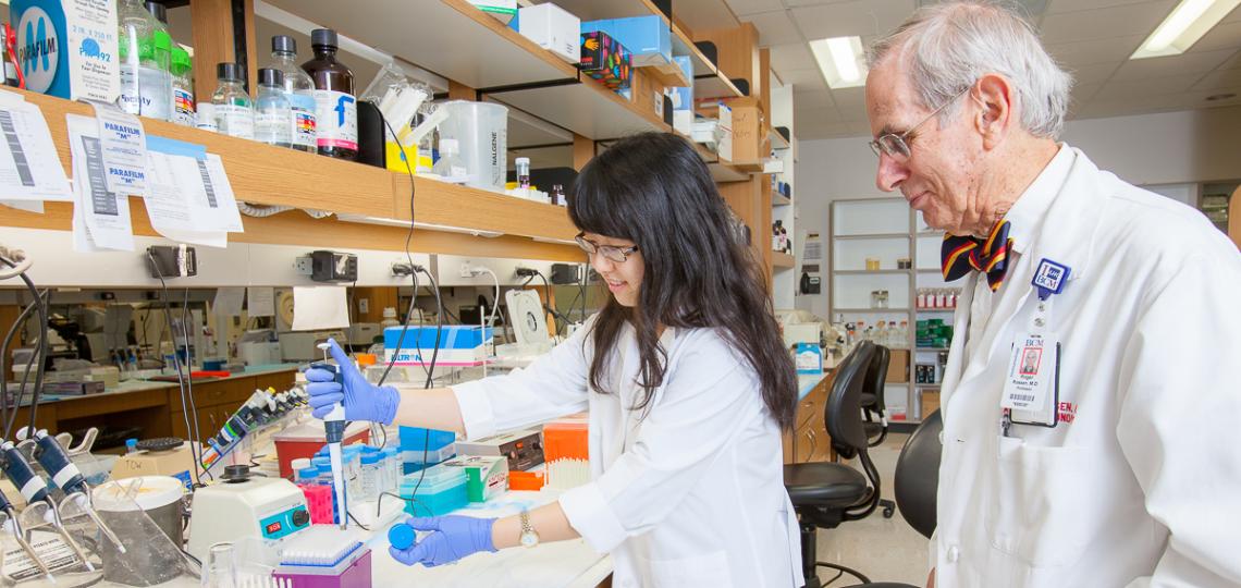 Dr. Roger Rossen in the lab with student
