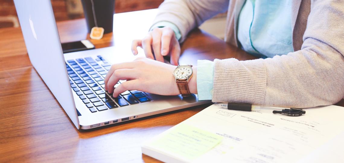 Person sitting at laptop