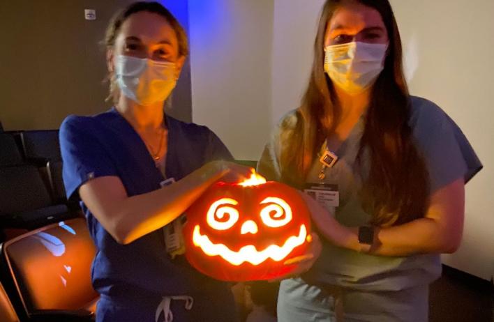Drs. LePoidevin and Williams show off their Jack Oâlantern.