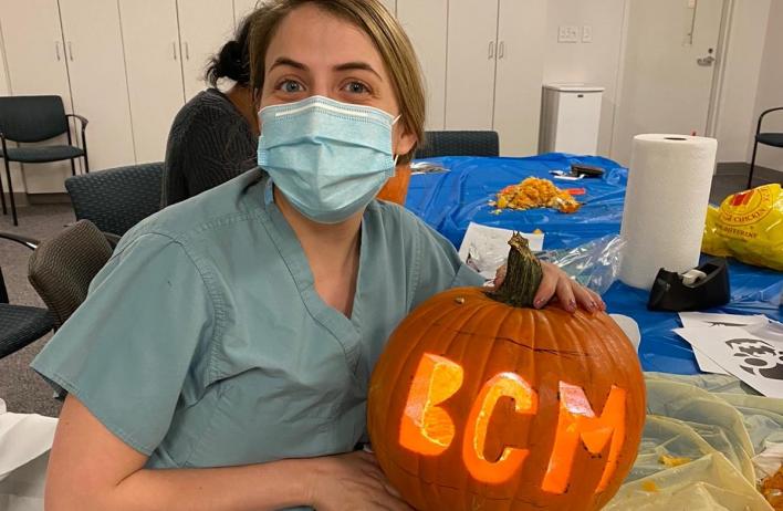 Dr. Clark poses with her BCM Jack Oâlantern.