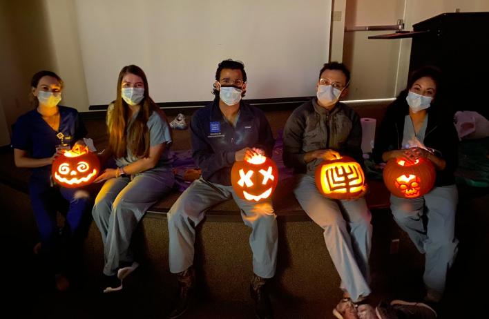 OBGYN residents participate in a socially distanced pumpkin carving during the first Wellness Wednesday in October.