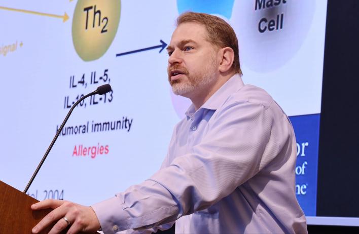 Dr. Decker Ph.D. speaks during the 2022 Annual Pathology and Immunology Trainee Research Symposium.