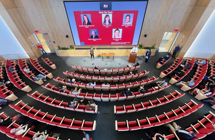 A view from above of the auditorium at the 2022 Annual Pathology and Immunology Trainee Research Symposium.