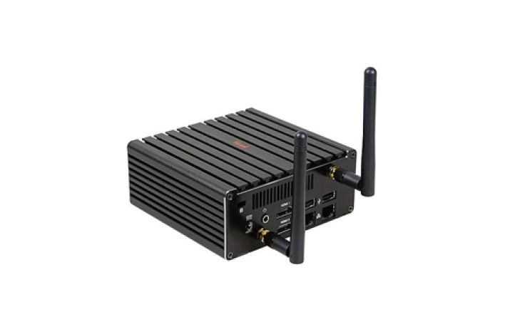 Superlogics MicroBox PC hidden behind TV