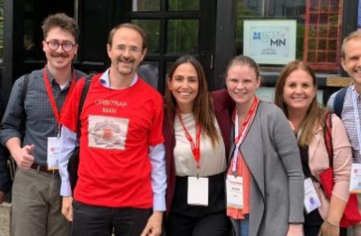 Group members meet Alexander Makarov, inventor of the Orbitrap, at the 2022 ASMS Annual Conference