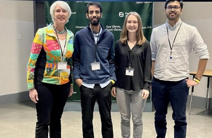 Winners of the 14 presenters: Standing next to Dr. Goodell, first place, Srikanth Kodali, second place, Courtney Chambers, and third place, Gandhar Datar