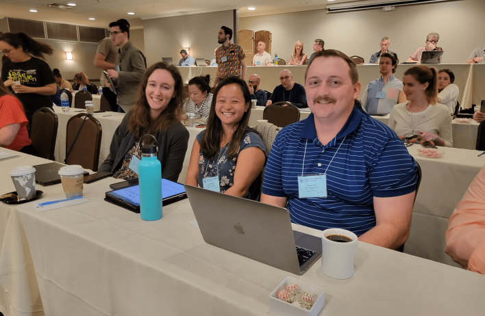 Four lab members attending the 2023 Gordon Research Conference.