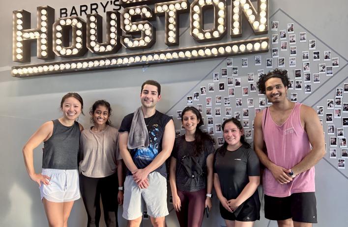 Residents pose outside Barry's Houston