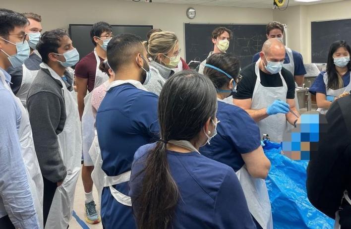 Students watching a demonstration in a classroom