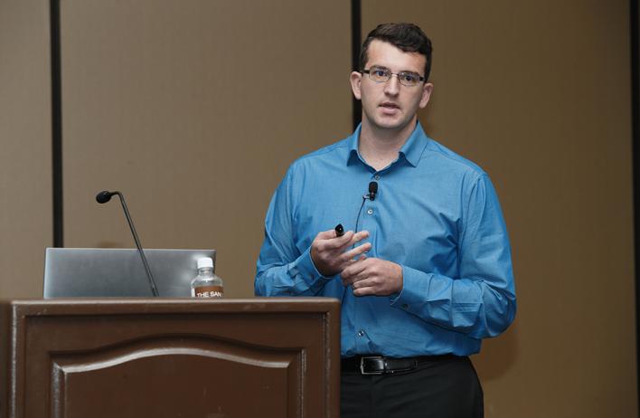 A person giving a speech behind a podium